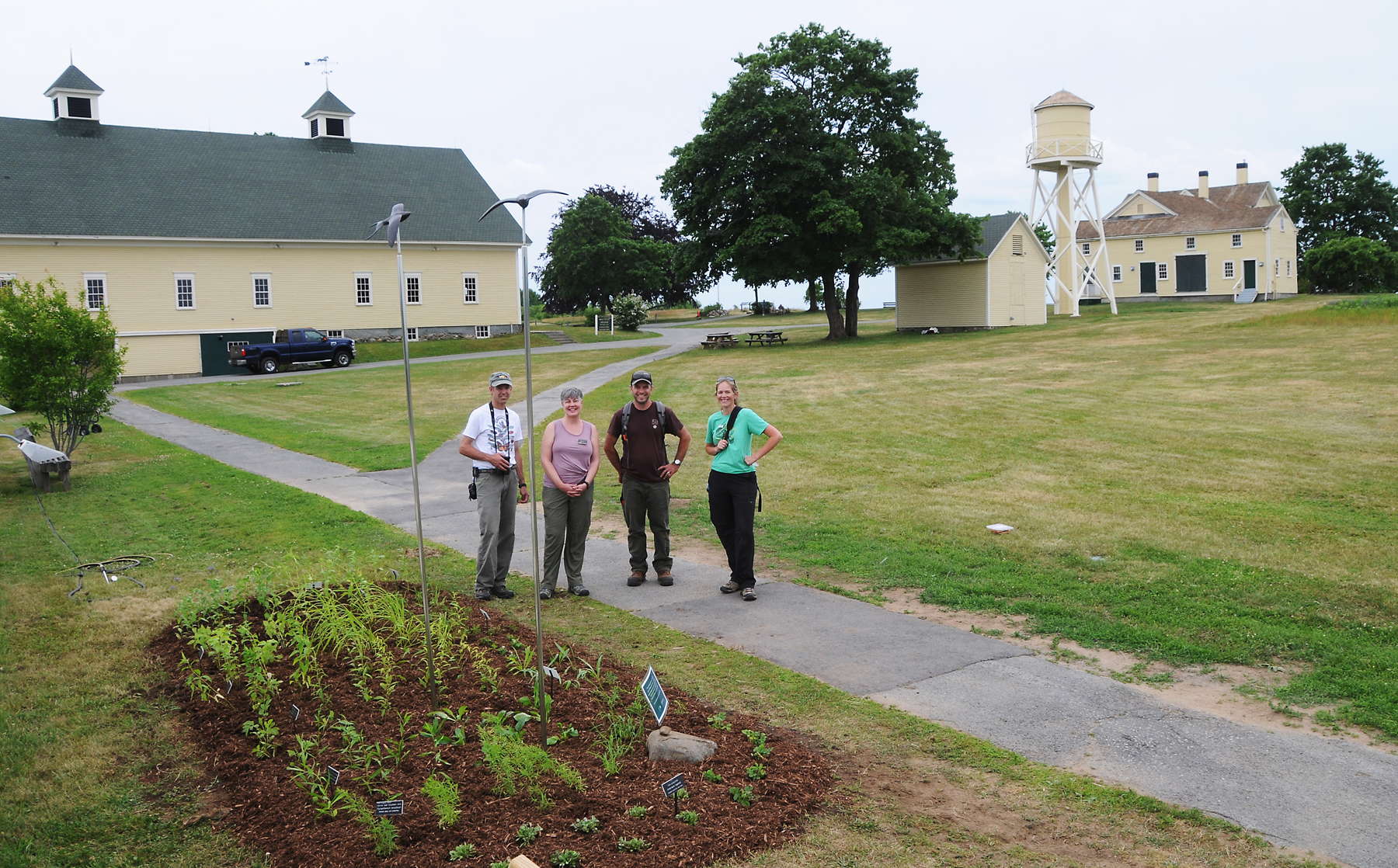Newly installed Pollinator Garden with some of the crew who planted it on the Laudholm campus in June 2018. Photo ? Allan Amioka